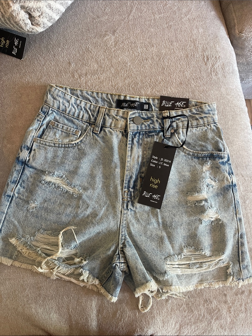 Women's Light Blue Distressed Denim Shorts